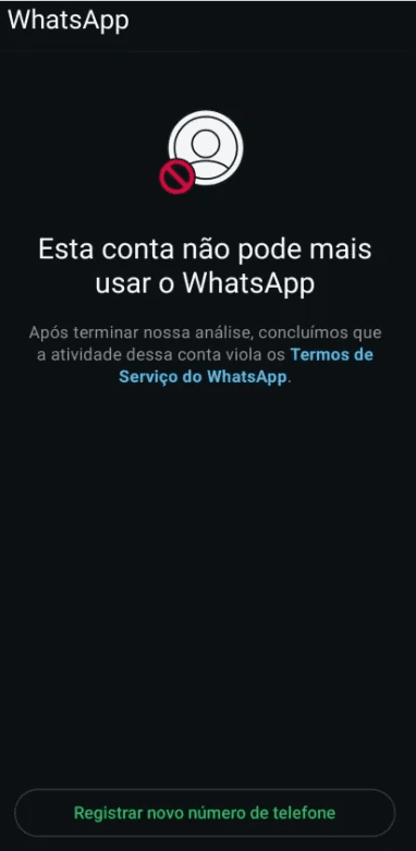 Tela real do WhatsApp informando que a conta não pode mais usar o aplicativo por violação dos Termos de Serviço, com a opção de registrar um novo número de telefone